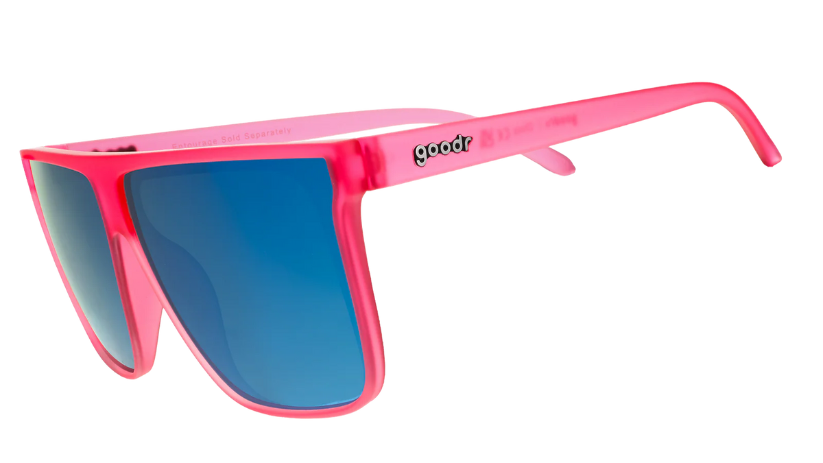 Hot pink sunglasses with mirrored reflective lenses in teal. Flat-top frames with a wider fit. No slip, no bounce, all polarised.