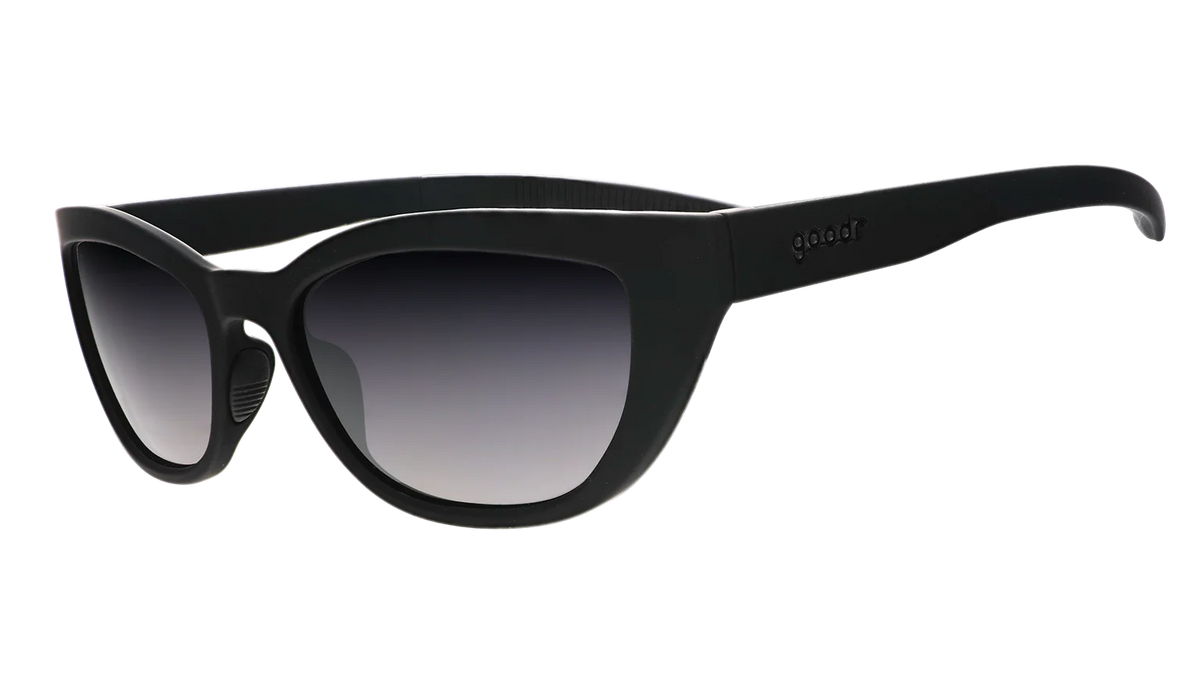 Black sunglasses with dark, gradient lenses. Simple and stylish cat-eye frames.