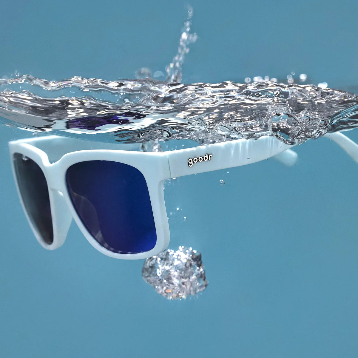 Light blue polarised sunglasses with mirrored reflective lenses. Water repellent and capable of floating.